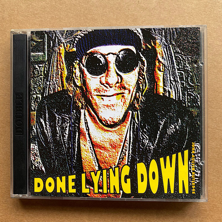 DONE LYING DOWN - John Austin Rutledge